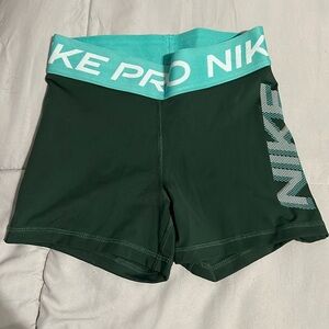 Like new - dark Green and Teal Women’s XS Nike Pro 3” shorts